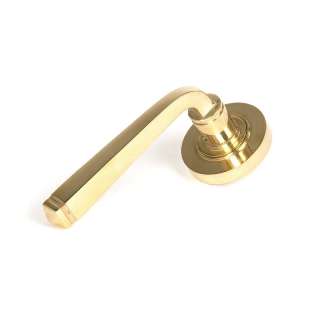 This is an image of From The Anvil - Polished Brass Avon Round Lever on Rose Set (Plain) available to order from T.H Wiggans Architectural Ironmongery in Kendal, quick delivery and discounted prices.