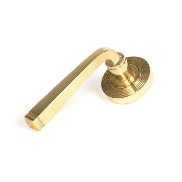 This is an image of From The Anvil - Polished Brass Avon Round Lever on Rose Set (Beehive) available to order from T.H Wiggans Architectural Ironmongery in Kendal, quick delivery and discounted prices.