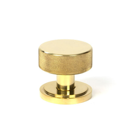 This is an image showing From The Anvil - Polished Brass Brompton Mortice/Rim Knob Set Knob (Art Deco) available from trade door handles, quick delivery and discounted prices