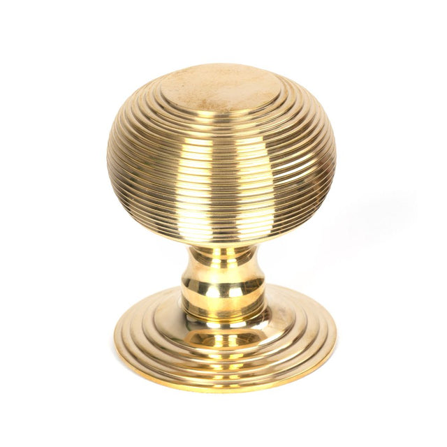 This is an image of From The Anvil - Polished Brass Beehive Centre Door Knob available to order from T.H Wiggans Architectural Ironmongery in Kendal, quick delivery and discounted prices.