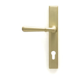 This is an image showing From The Anvil - Satin Brass Newbury Slimline Lever Espag. Lock Set available from trade door handles, quick delivery and discounted prices