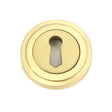 This is an image of From The Anvil - Satin Brass Round Escutcheon (Art Deco) available to order from T.H Wiggans Architectural Ironmongery in Kendal, quick delivery and discounted prices.