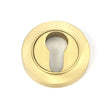 This is an image of From The Anvil - Satin Brass Round Euro Escutcheon (Plain) available to order from T.H Wiggans Architectural Ironmongery in Kendal, quick delivery and discounted prices.