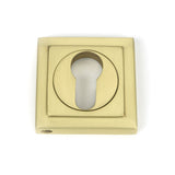 This is an image of From The Anvil - Satin Brass Round Euro Escutcheon (Square) available to order from T.H Wiggans Architectural Ironmongery in Kendal, quick delivery and discounted prices.