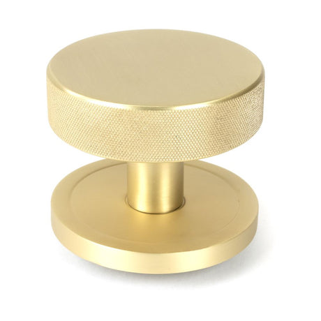 This is an image of From The Anvil - Satin Brass Brompton Centre Door Knob (Plain) available to order from T.H Wiggans Architectural Ironmongery in Kendal, quick delivery and discounted prices.