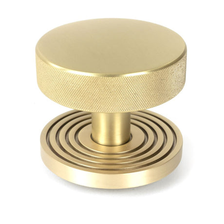 This is an image of From The Anvil - Satin Brass Brompton Centre Door Knob (Beehive) available to order from T.H Wiggans Architectural Ironmongery in Kendal, quick delivery and discounted prices.