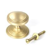 This is an image showing From The Anvil - Satin Brass Art Deco Centre Door Knob available from trade door handles, quick delivery and discounted prices