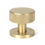 This is an image showing From The Anvil - Satin Brass Brompton Mortice/Rim Knob Set (Plain) available from trade door handles, quick delivery and discounted prices