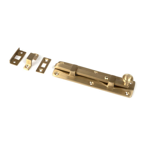 This is an image showing From The Anvil - Satin Brass 6" Universal Bolt available from T.H Wiggans Architectural Ironmongery in Kendal, quick delivery and discounted prices