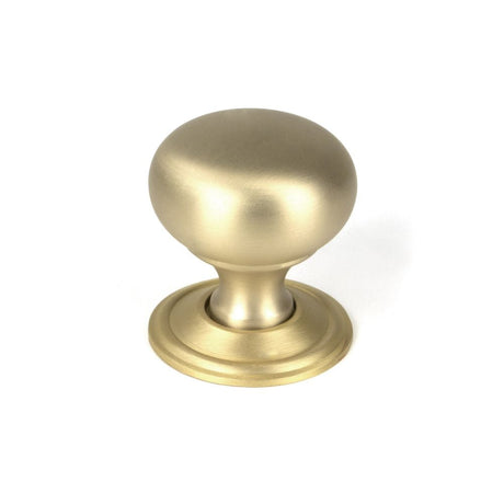 This is an image showing From The Anvil - Satin Brass Mushroom Cabinet Knob 32mm available from T.H Wiggans Architectural Ironmongery in Kendal, quick delivery and discounted prices