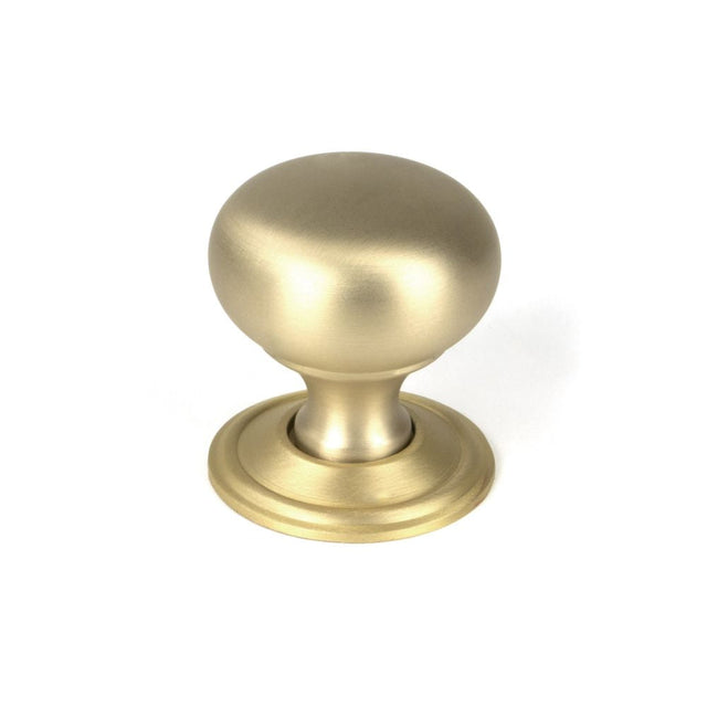This is an image showing From The Anvil - Satin Brass Mushroom Cabinet Knob 32mm available from T.H Wiggans Architectural Ironmongery in Kendal, quick delivery and discounted prices