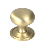 This is an image showing From The Anvil - Satin Brass Mushroom Cabinet Knob 38mm available from T.H Wiggans Architectural Ironmongery in Kendal, quick delivery and discounted prices