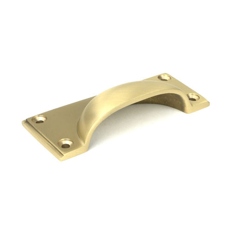 This is an image showing From The Anvil - Satin Brass Art Deco Drawer Pull available from trade door handles, quick delivery and discounted prices