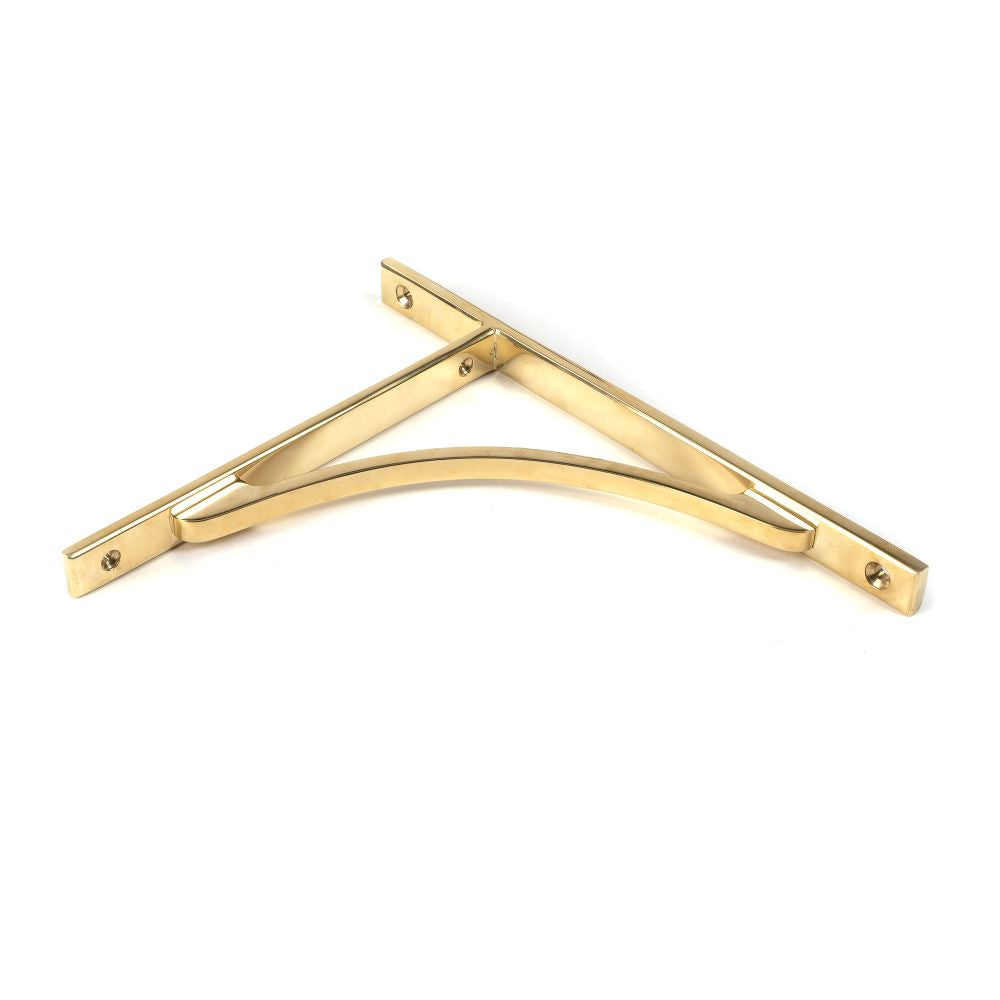 This is an image showing From The Anvil - Polished Brass Apperley Shelf Bracket (260mm x 200mm) available from trade door handles, quick delivery and discounted prices