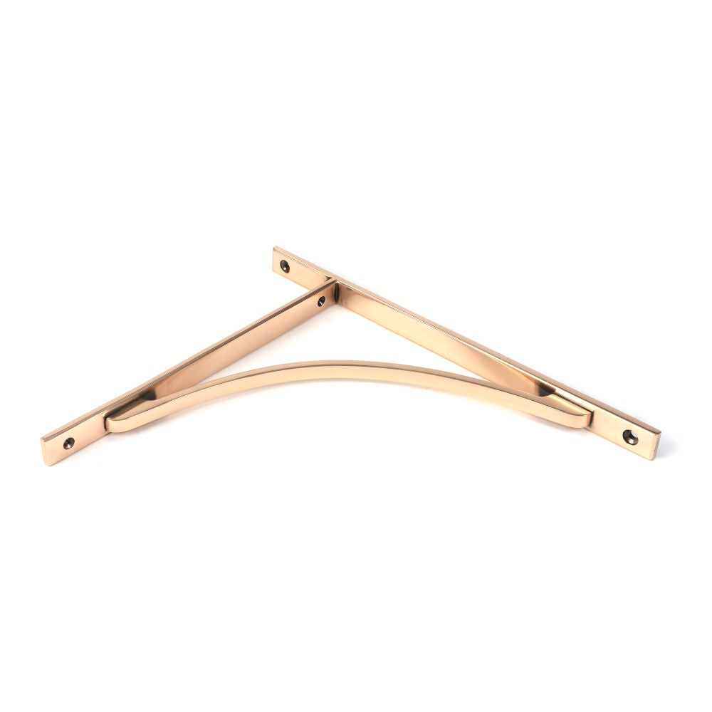 This is an image showing From The Anvil - Polished Bronze Apperley Shelf Bracket (314mm x 250mm) available from trade door handles, quick delivery and discounted prices