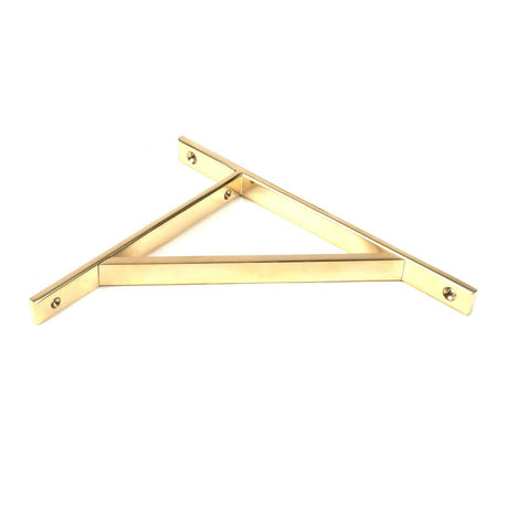 This is an image showing From The Anvil - Polished Brass Chalfont Shelf Bracket (260mm x 200mm) available from trade door handles, quick delivery and discounted prices