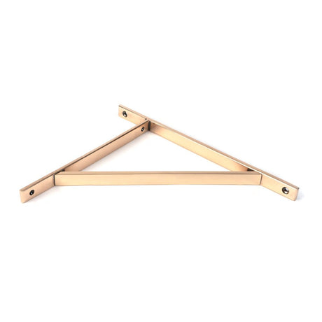 This is an image showing From The Anvil - Polished Bronze Chalfont Shelf Bracket (314mm x 250mm) available from trade door handles, quick delivery and discounted prices