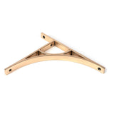 This is an image showing From The Anvil - Polished Bronze Tyne Shelf Bracket (260mm x 200mm) available from trade door handles, quick delivery and discounted prices