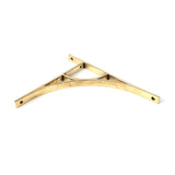 This is an image showing From The Anvil - Aged Brass Tyne Shelf Bracket (314mm x 250mm) available from trade door handles, quick delivery and discounted prices