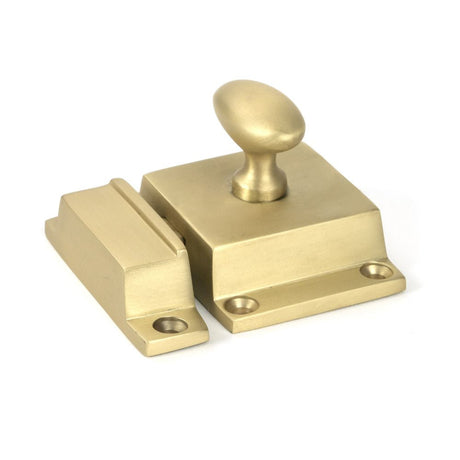 This is an image showing From The Anvil - Satin Brass Cabinet Latch available from T.H Wiggans Architectural Ironmongery in Kendal, quick delivery and discounted prices