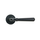 This is an image showing From The Anvil - Matt Black Newbury Lever on Rose Set (Plain) - Unsprung available from trade door handles, quick delivery and discounted prices