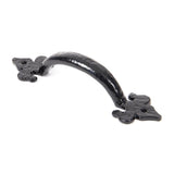 This is an image showing From The Anvil - Black Cast 6" Fleur De Lys Pull Handle available from T.H Wiggans Architectural Ironmongery in Kendal, quick delivery and discounted prices