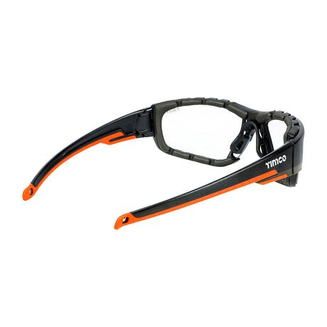 This is an image showing TIMCO Sports Style Safety Glasses - With Foam Dust Guard - Clear - One Size - 1 Each Box available from T.H Wiggans Ironmongery in Kendal, quick delivery at discounted prices.