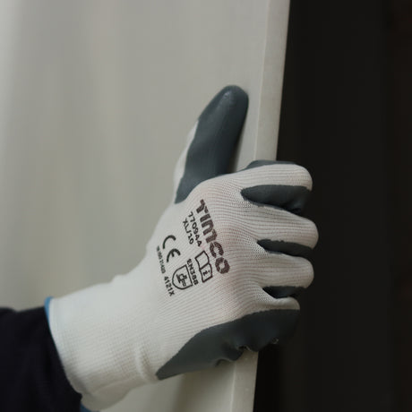 This is an image showing TIMCO Secure Grip Gloves - Smooth Nitrile Foam Coated Polyester - Large - 1 Each Backing Card available from T.H Wiggans Ironmongery in Kendal, quick delivery at discounted prices.