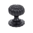 This is an image showing From The Anvil - Black Flower Cabinet Knob - Small available from T.H Wiggans Architectural Ironmongery in Kendal, quick delivery and discounted prices