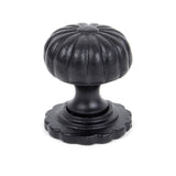 This is an image showing From The Anvil - Black Flower Cabinet Knob - Small available from T.H Wiggans Architectural Ironmongery in Kendal, quick delivery and discounted prices