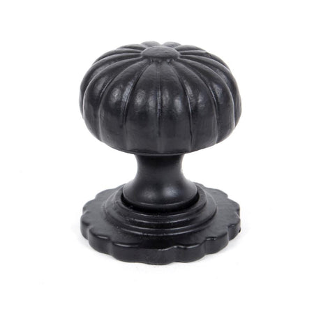 This is an image showing From The Anvil - Black Flower Cabinet Knob - Small available from T.H Wiggans Architectural Ironmongery in Kendal, quick delivery and discounted prices