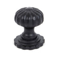 This is an image showing From The Anvil - Black Flower Cabinet Knob - Large available from T.H Wiggans Architectural Ironmongery in Kendal, quick delivery and discounted prices