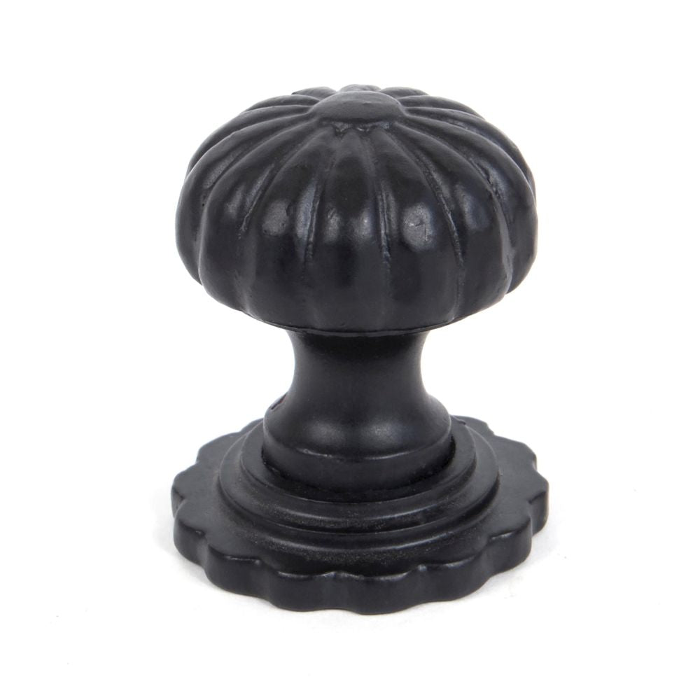 This is an image showing From The Anvil - Black Flower Cabinet Knob - Large available from T.H Wiggans Architectural Ironmongery in Kendal, quick delivery and discounted prices