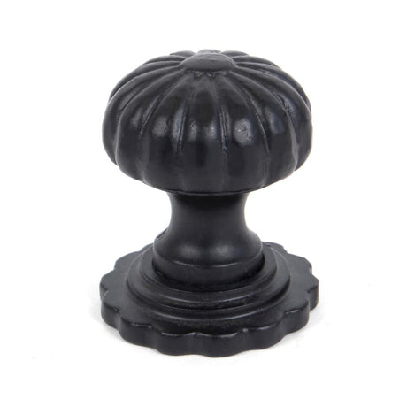This is an image showing From The Anvil - Black Flower Cabinet Knob - Large available from T.H Wiggans Architectural Ironmongery in Kendal, quick delivery and discounted prices