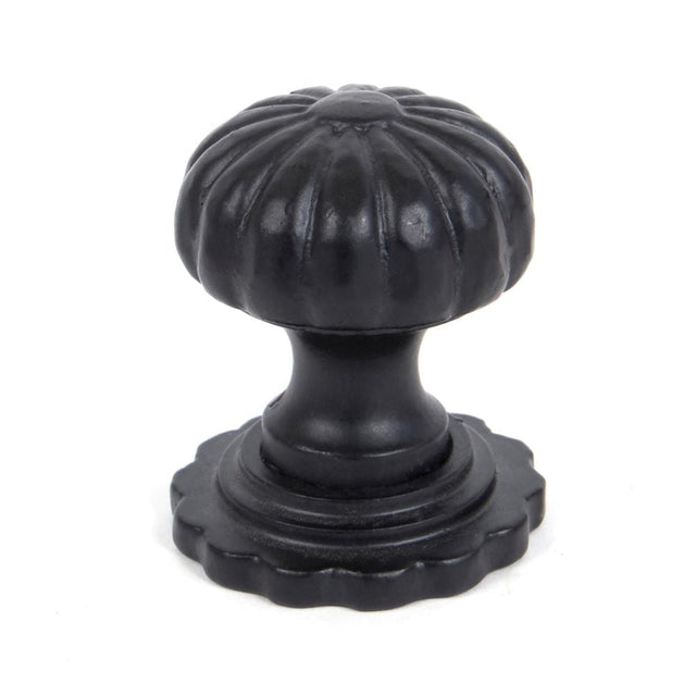 This is an image showing From The Anvil - Black Flower Cabinet Knob - Large available from T.H Wiggans Architectural Ironmongery in Kendal, quick delivery and discounted prices