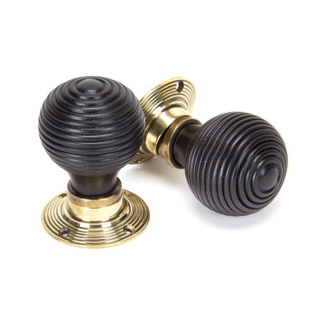 This is an image of From The Anvil - Ebony & Aged Brass Beehive Mortice/Rim Knob Set available to order from T.H Wiggans Architectural Ironmongery in Kendal, quick delivery and discounted prices.