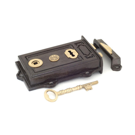 This is an image showing From The Anvil - Iron Davenport Rim Lock available from T.H Wiggans Architectural Ironmongery in Kendal, quick delivery and discounted prices