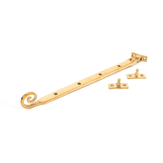 This is an image showing From The Anvil - Polished Brass 12" Monkeytail Stay available from T.H Wiggans Architectural Ironmongery in Kendal, quick delivery and discounted prices