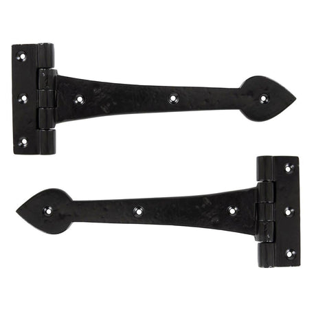 This is an image showing From The Anvil - Black Smooth 10 1/2" Cast T Hinge (pair) available from T.H Wiggans Architectural Ironmongery, quick delivery and discounted prices