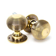 This is an image of From The Anvil - Aged Brass Heavy Beehive Mortice/Rim Knob Set available to order from T.H Wiggans Architectural Ironmongery in Kendal, quick delivery and discounted prices.