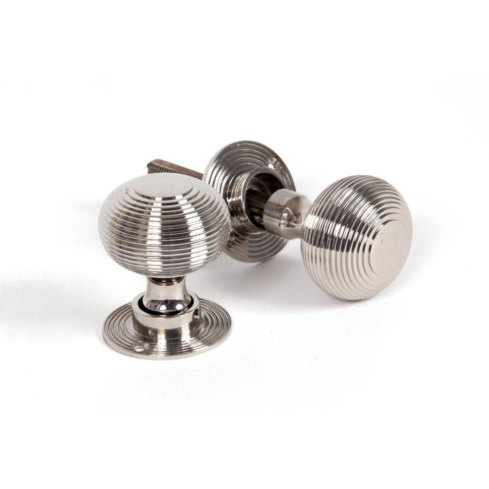 This is an image of From The Anvil - Polished Nickel Heavy Beehive Mortice/Rim Knob Set available to order from T.H Wiggans Architectural Ironmongery in Kendal, quick delivery and discounted prices.