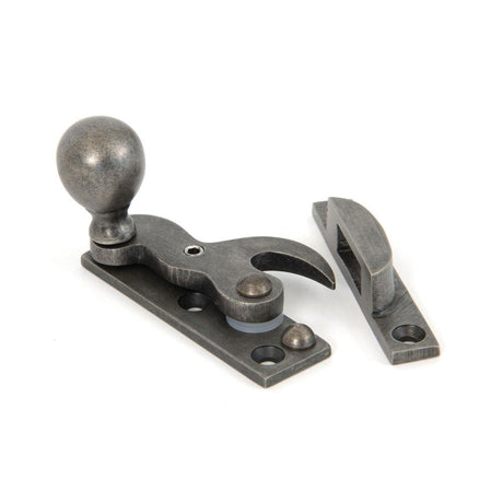 This is an image showing From The Anvil - Antique Pewter Sash Hook Fastener available from T.H Wiggans Architectural Ironmongery in Kendal, quick delivery and discounted prices