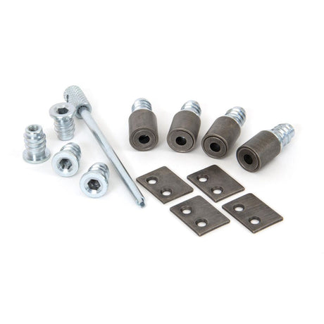 This is an image showing From The Anvil - Antique Pewter Secure Stops (Pack of 4) available from T.H Wiggans Architectural Ironmongery in Kendal, quick delivery and discounted prices
