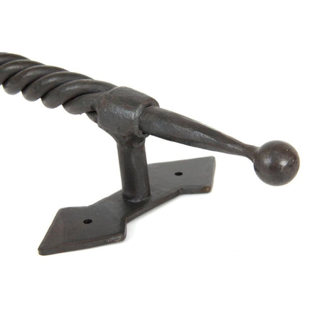 This is an image showing From The Anvil - Beeswax Large Robe Pull Handle available from trade door handles, quick delivery and discounted prices