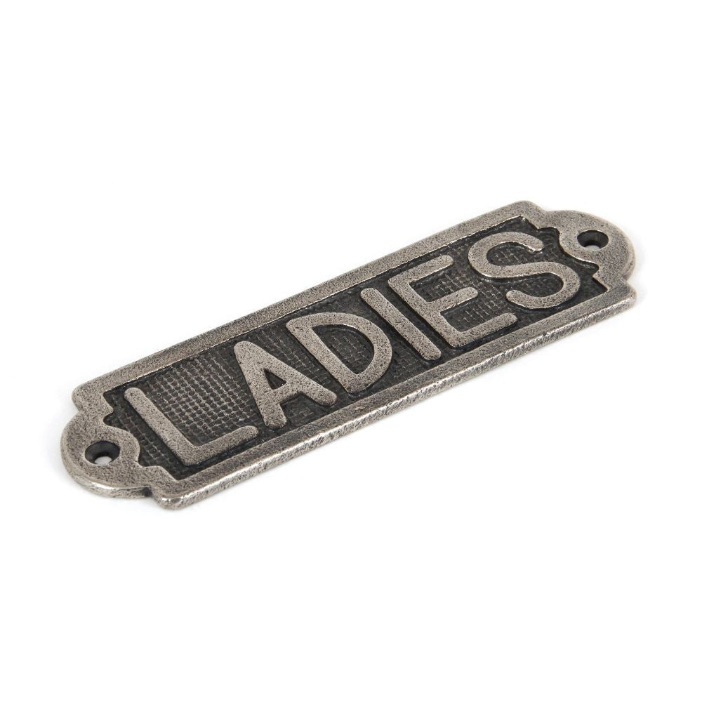 This is an image of From The Anvil - Antique Pewter Ladies Sign available to order from T.H Wiggans Architectural Ironmongery in Kendal, quick delivery and discounted prices.