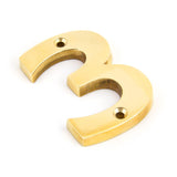 This is an image of From The Anvil - Polished Brass Numeral 3 available to order from T.H Wiggans Architectural Ironmongery in Kendal, quick delivery and discounted prices.