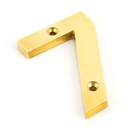 This is an image of From The Anvil - Polished Brass Numeral 7 available to order from T.H Wiggans Architectural Ironmongery in Kendal, quick delivery and discounted prices.
