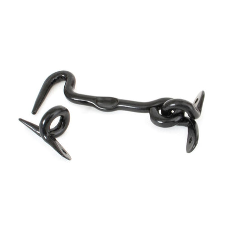 This is an image showing From The Anvil - Black 4" Forged Cabin Hook available from T.H Wiggans Architectural Ironmongery in Kendal, quick delivery and discounted prices
