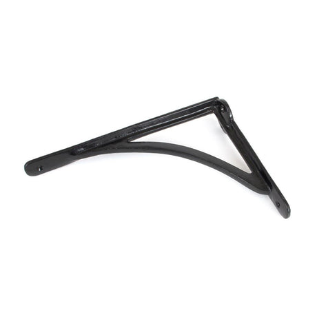 This is an image showing From The Anvil - Black 10'' x 7'' Curved Shelf Bracket available from trade door handles, quick delivery and discounted prices