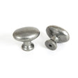 This is an image showing From The Anvil - Pewter Oval Cabinet Knob available from T.H Wiggans Architectural Ironmongery in Kendal, quick delivery and discounted prices